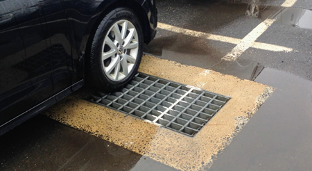 storm drain in parking lot